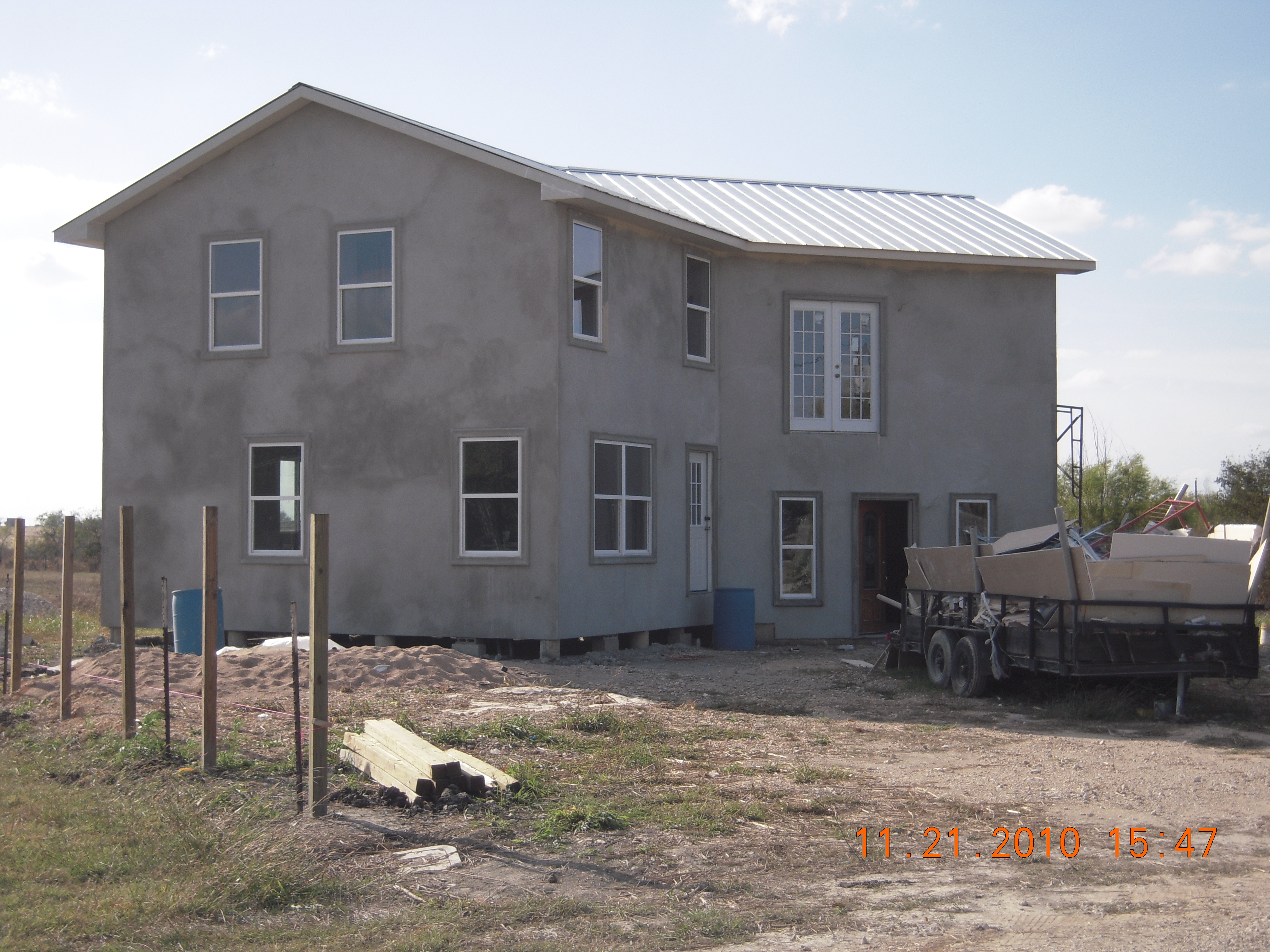 Redwood House with stucco